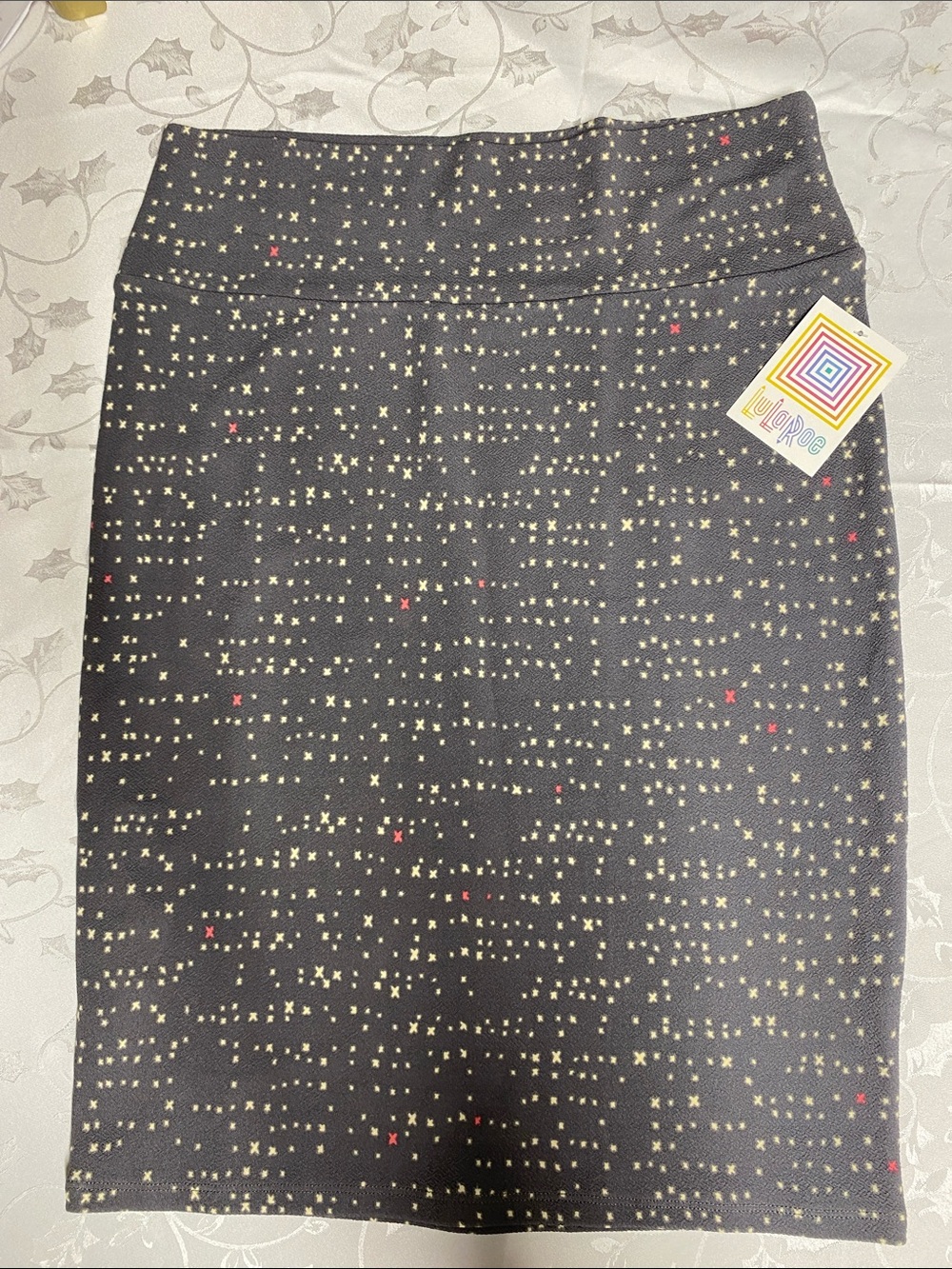 LuLaRoe Black Pencil Skirt with Cream Dot & Red Star Accents